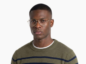 Man model wearing Dali gold metal eyeglasses from Vediview