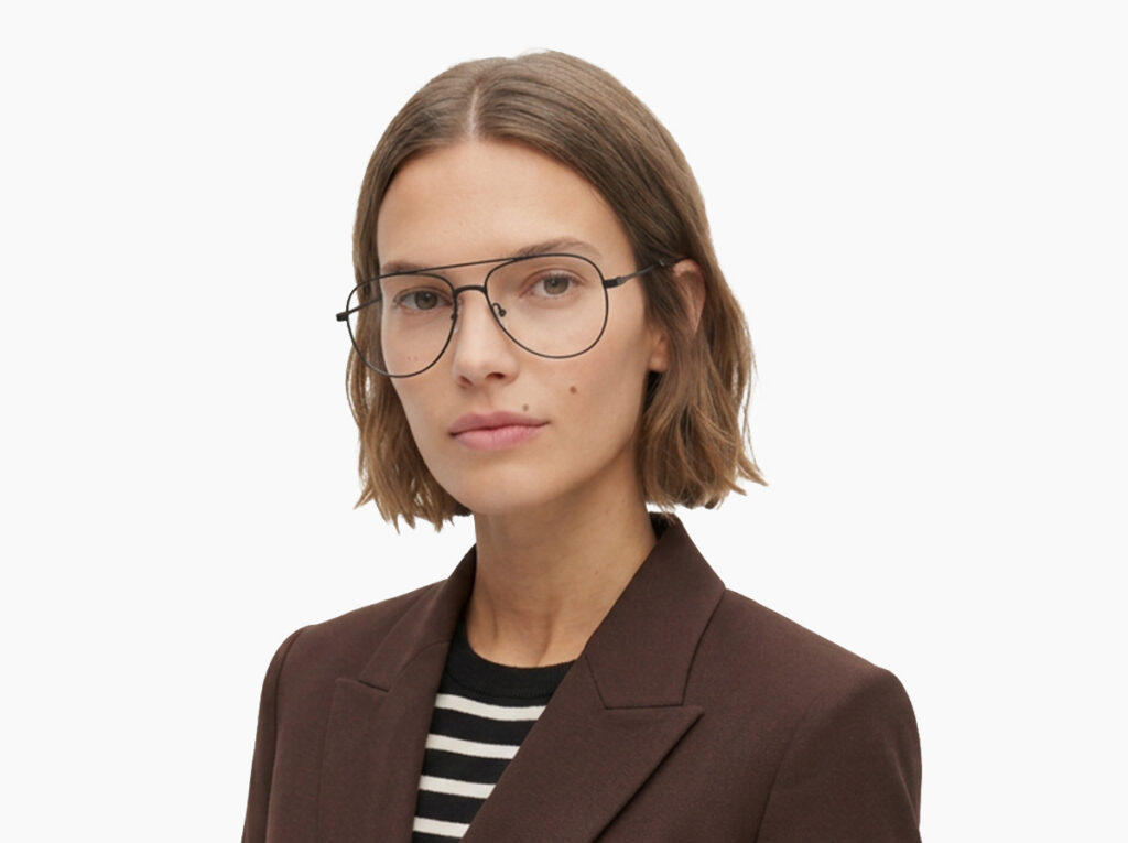 Woman model wearing Dali black metal eyeglasses from Vediview