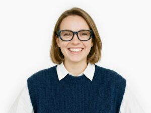 Woman model wearing Lillian blue-tortoise acetate eyeglasses from Vediview