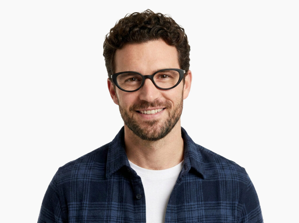 Man model wearing Murasaki black acetate eyeglasses from Vediview