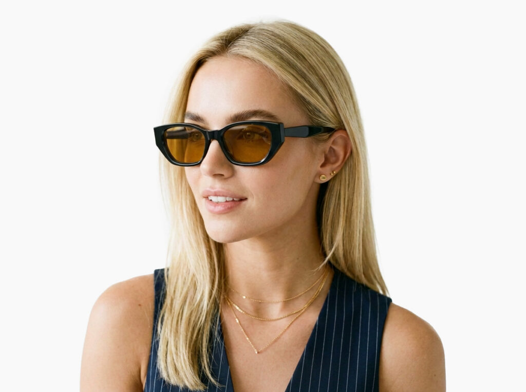 Woman model wearing Achebe black acetate sunglasses from Vediview