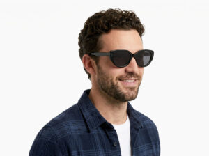Man model wearing Brancusi black TR90 sunglasses with grey polarized lenses from Vediview