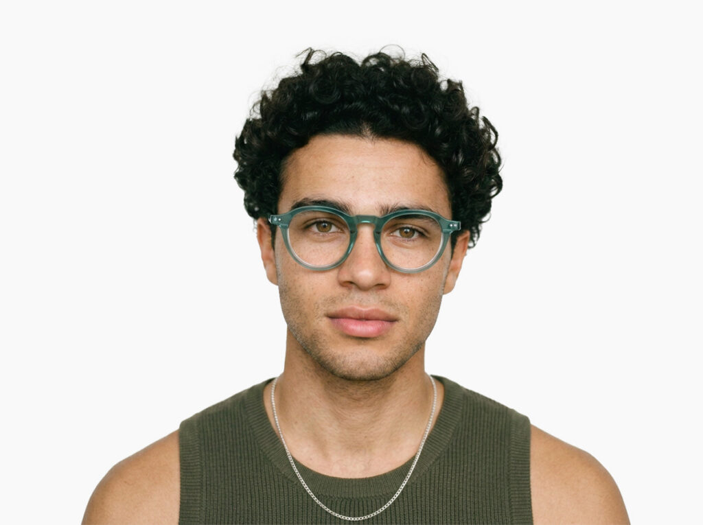 Man model wearing Breuer blue-green acetate eyeglasses from Vediview