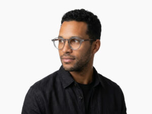 Man model wearing Breuer grey acetate eyeglasses from Vediview