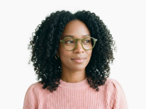 Woman model wearing Breuer green acetate eyeglasses from Vediview