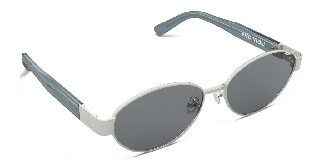 Angled view of Klimt silver oval sunglasses with grey polarized lenses from Vediview