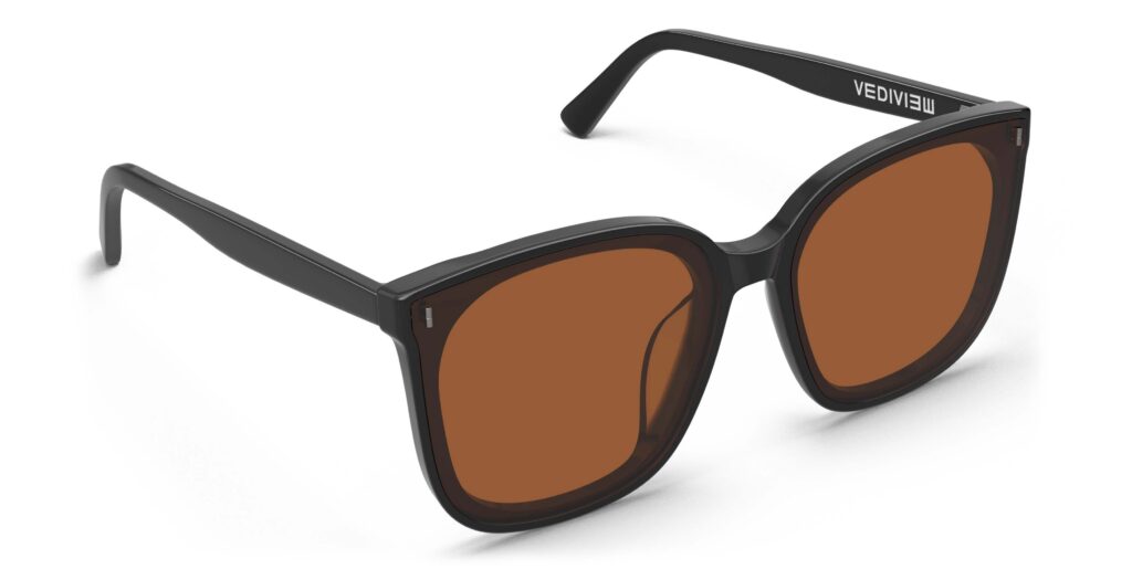 Angled view of Neutra black square sunglasses with orange lenses from Vediview