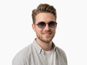 Man model wearing Alva black metal sunglasses from Vediview