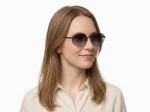 Woman model wearing Alva black metal sunglasses from Vediview