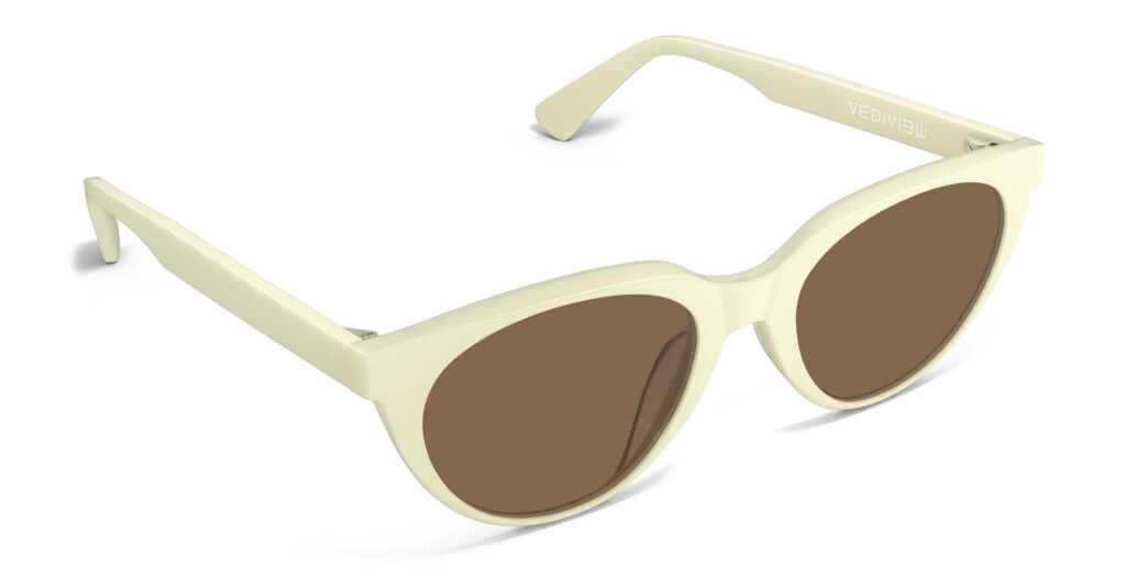 Angled view of Callas cream cat eye sunglasses with brown lenses from Vediview