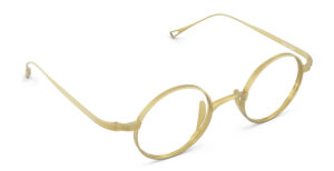 Angled view of Chaplin gold round eyeglasses from Vediview