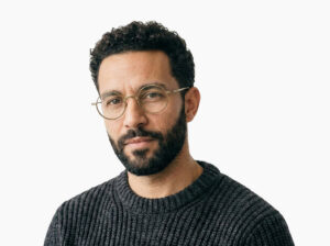 Man model wearing Chaplin bronze titanium eyeglasses from Vediview