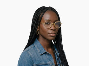 Woman model wearing Chaplin gold titanium eyeglasses from Vediview