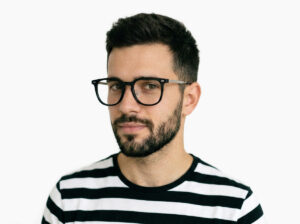 Man model wearing Merce black TR90 eyeglasses from Vediview