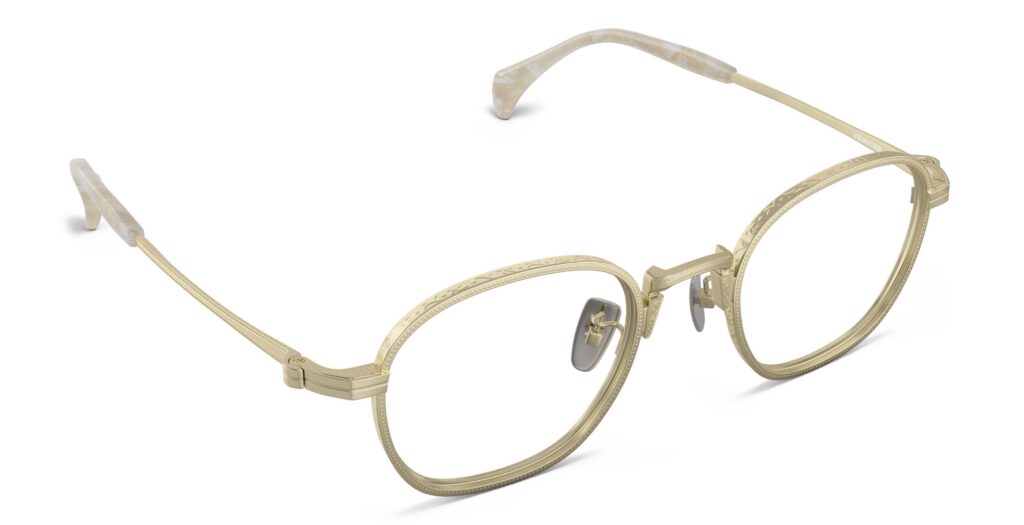 Angled view of Nico gold round eyeglasses from Vediview