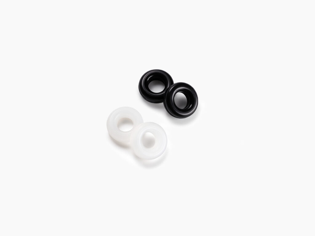 A set of black and white glasses anti-slip rings from Vediview
