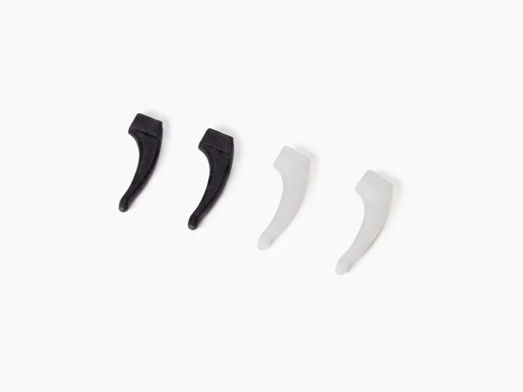 A set of black and white glasses ear grips from Vediview