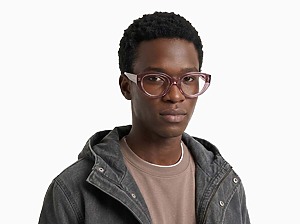 Man model wearing Garcia pink acetate eyeglasses from Vediview
