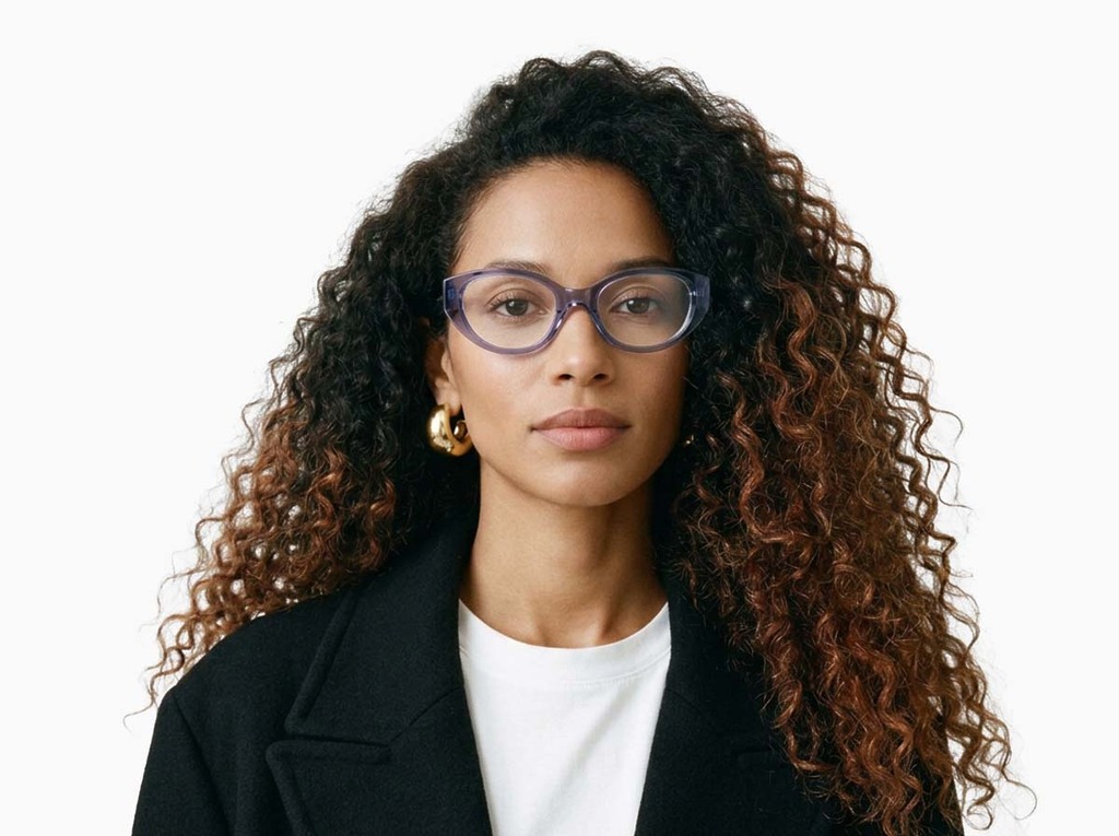 Woman model wearing Garcia purple acetate eyeglasses from Vediview